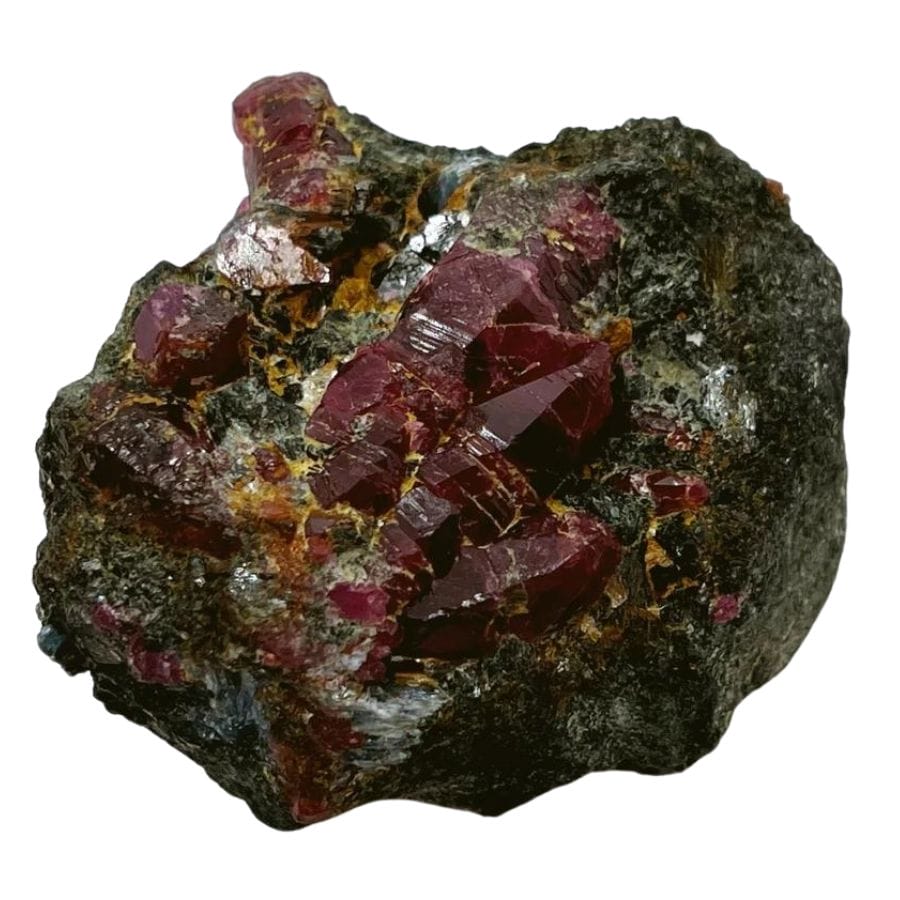 deep red ruby crystals embedded in a rock