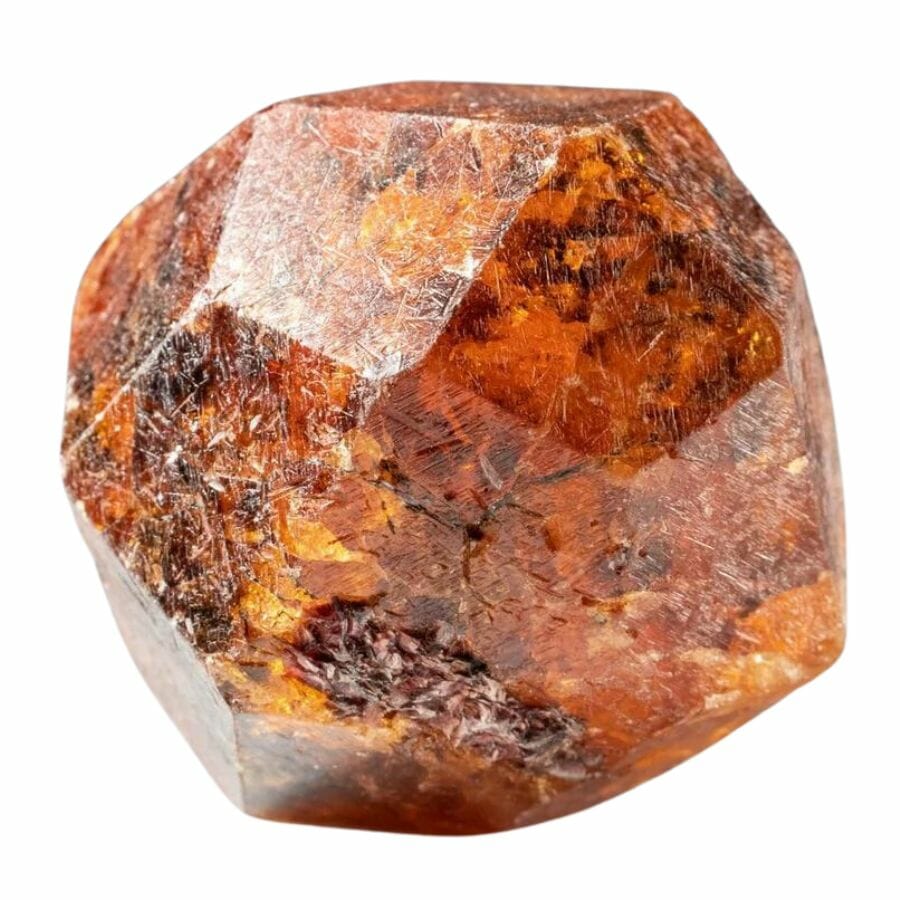 orange and brown rough spessartine garnet crystal with rough faces
