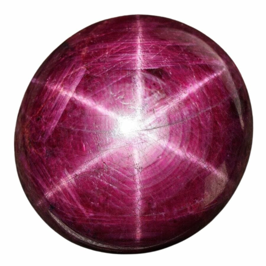 deep red round ruby cabochon with asterism
