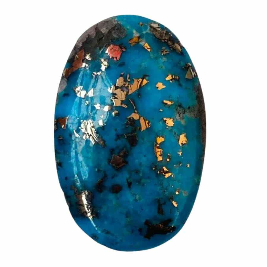 deep blue turquoise cabochon with black and pyrite matrix