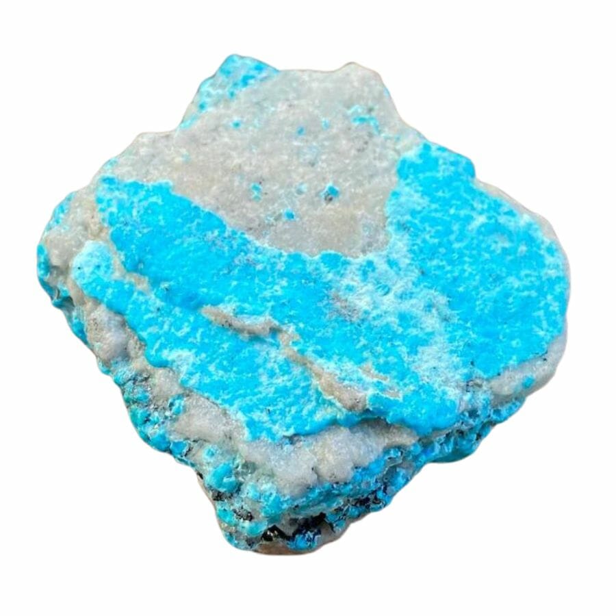 rough bright sky blue turquoise crust on a gray rock
