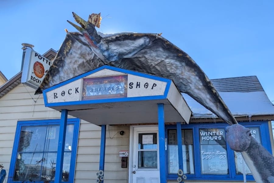 Front store window and building of the Antares Minerals & Pottery