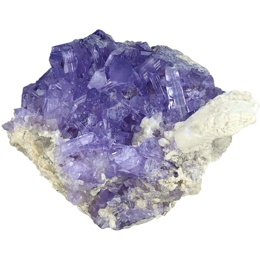 A mesmerizing purple apatite specimen with white minerals attached to it