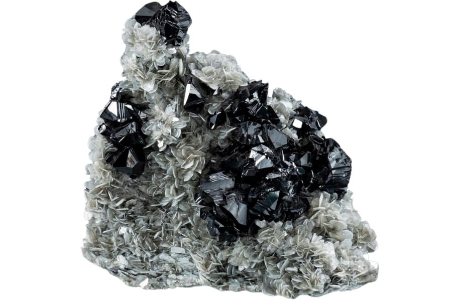 An excellent specimen of black twinned cassiterite on muscovite