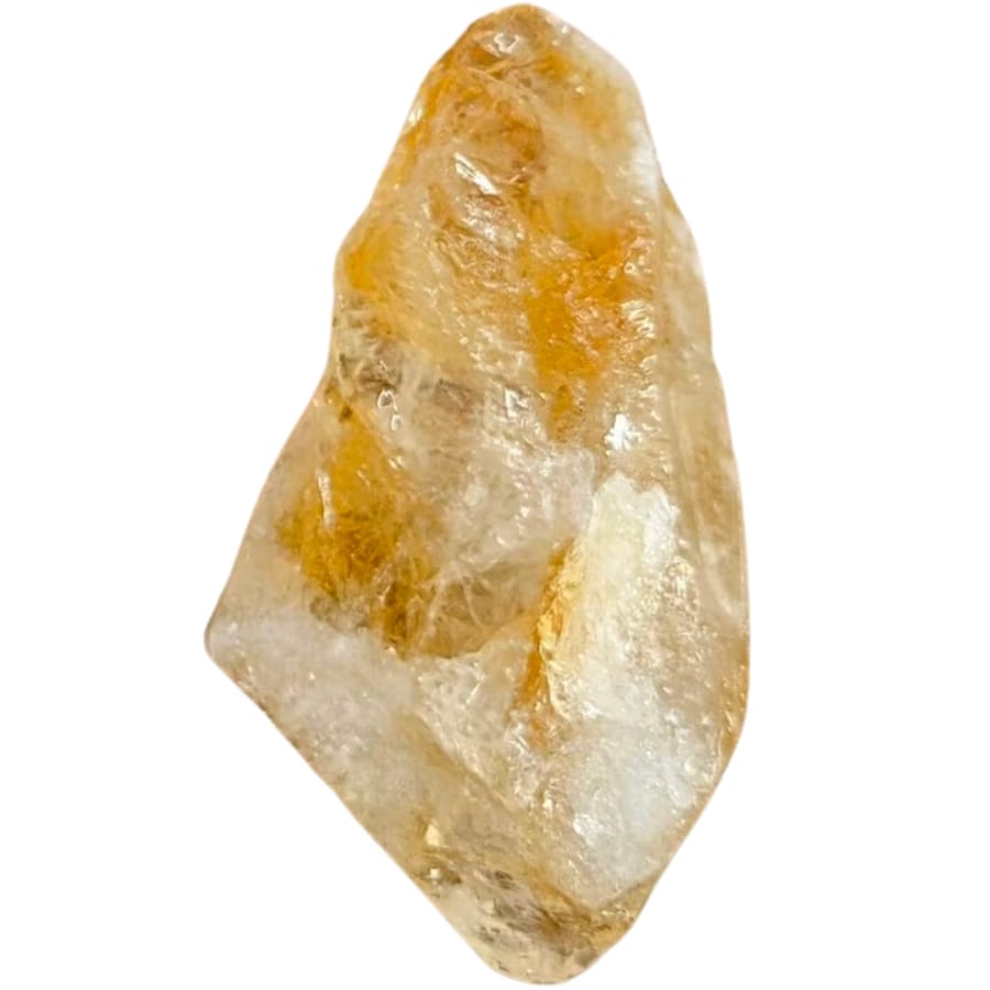 A raw piece of citrine with various yellow shades