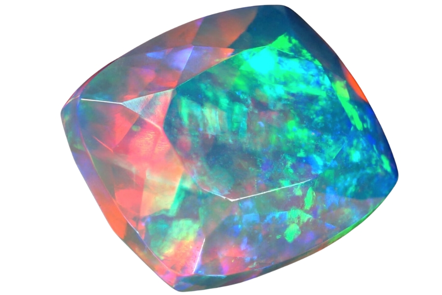 A cushion cut opal gemstone with a gorgeous color play