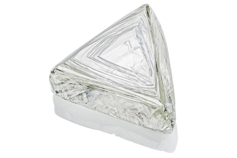 A triangular shaped polished and cut diamond crystal