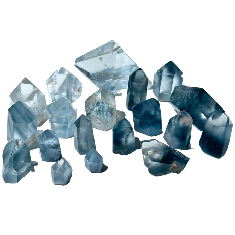 Cut and polished quartz crystals in different intensities of blue hues