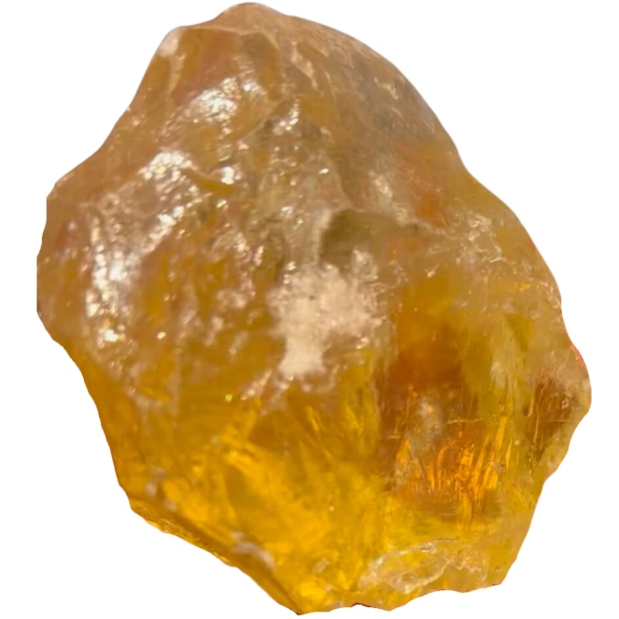 A piece of raw yellow topaz