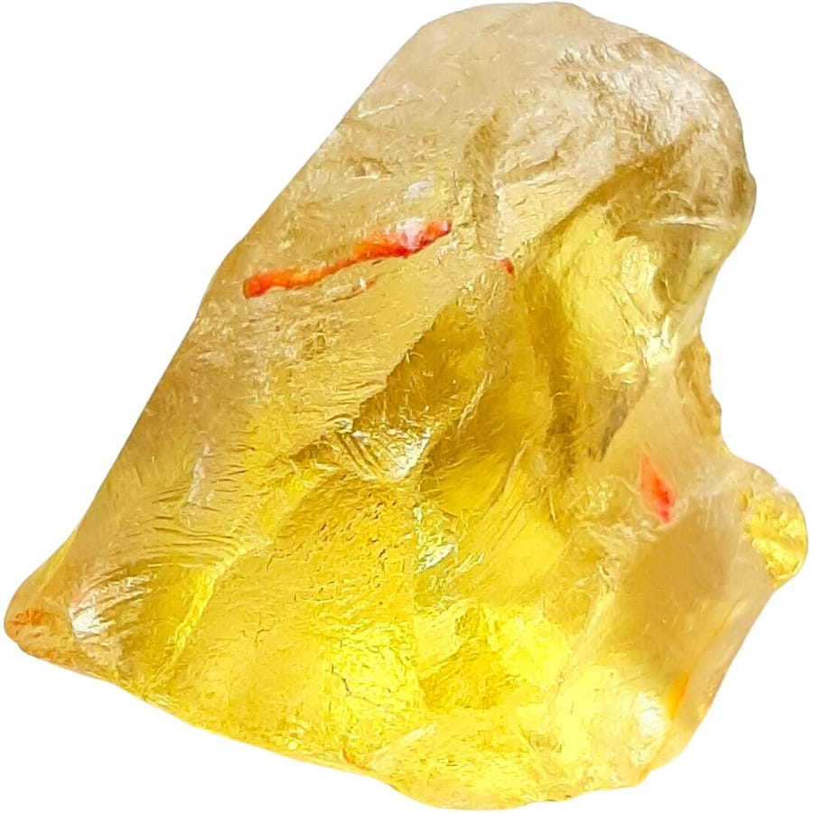 A raw yellow topaz with few red inclusions