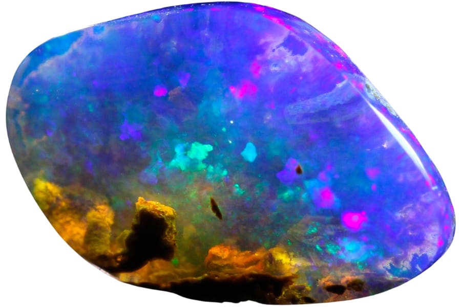 A stunning opal crystal showing play-of-color in violet, pink, green, blue