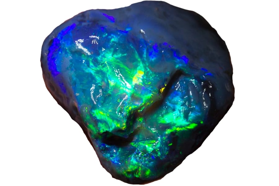 A huge chunk of black opal with vibrant flashes of blue and green hues