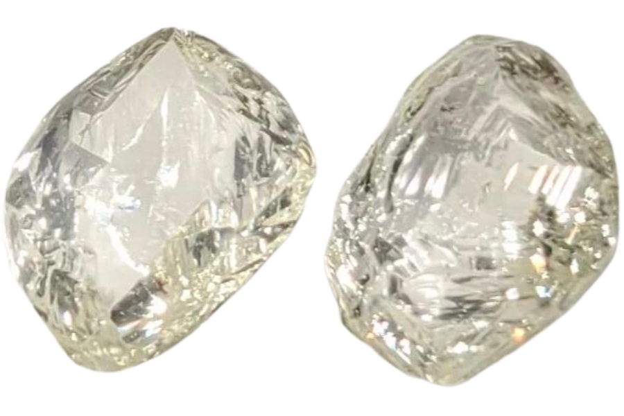 Two nearly identical yellowish white diamonds