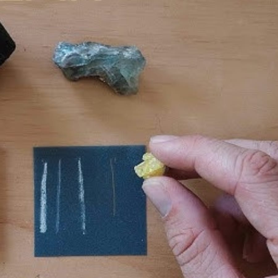 Performing a streak test on a mineral