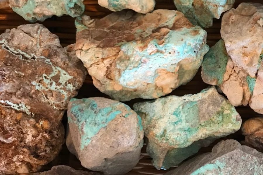 Pieces of raw and rough turquoise mined from the Mona Lisa Mine