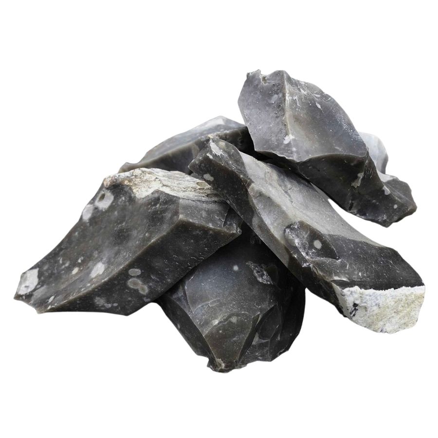 five rough black chert pieces