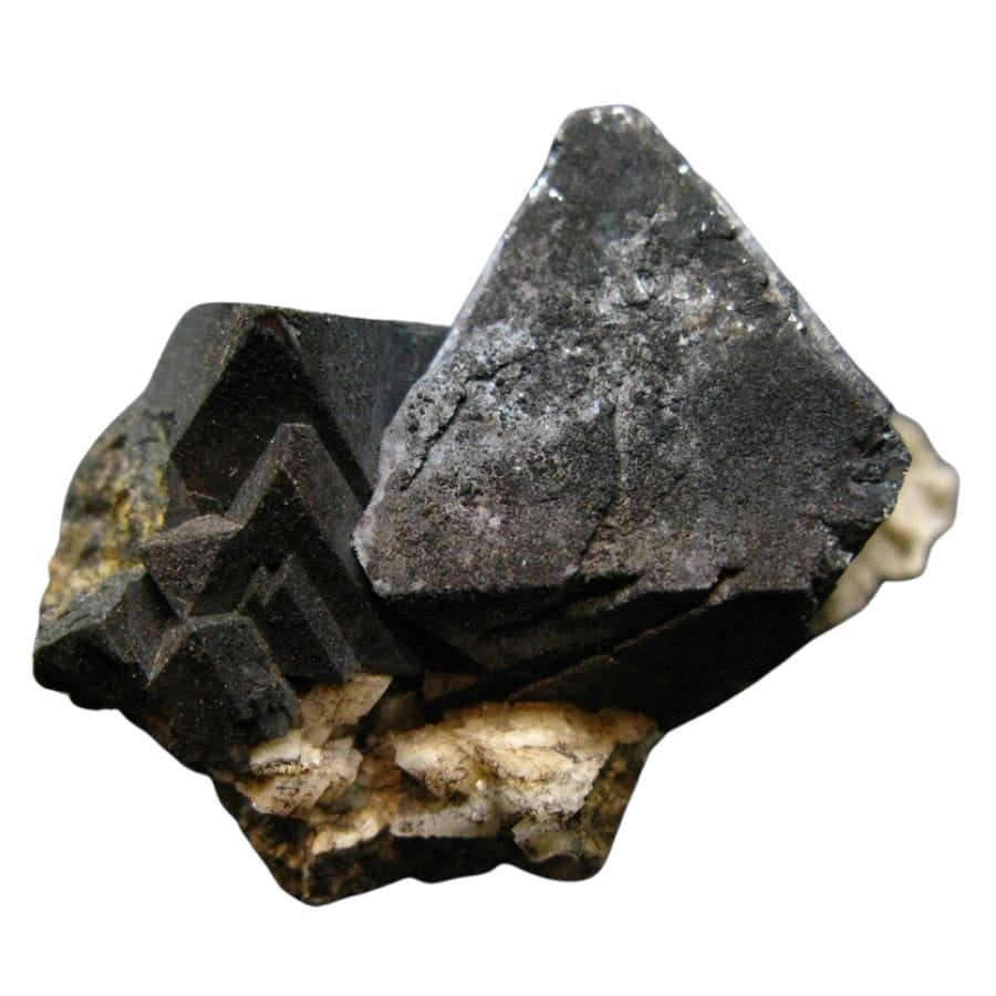 black pyramid-shaped magnetite crystals