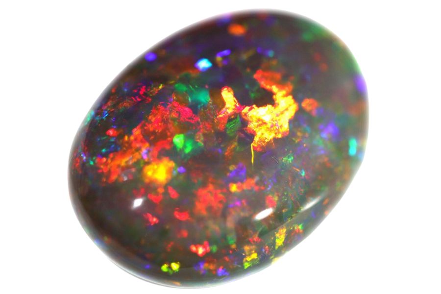 black opal cabochon with yellow, red, orange, blue, and green play-of-color