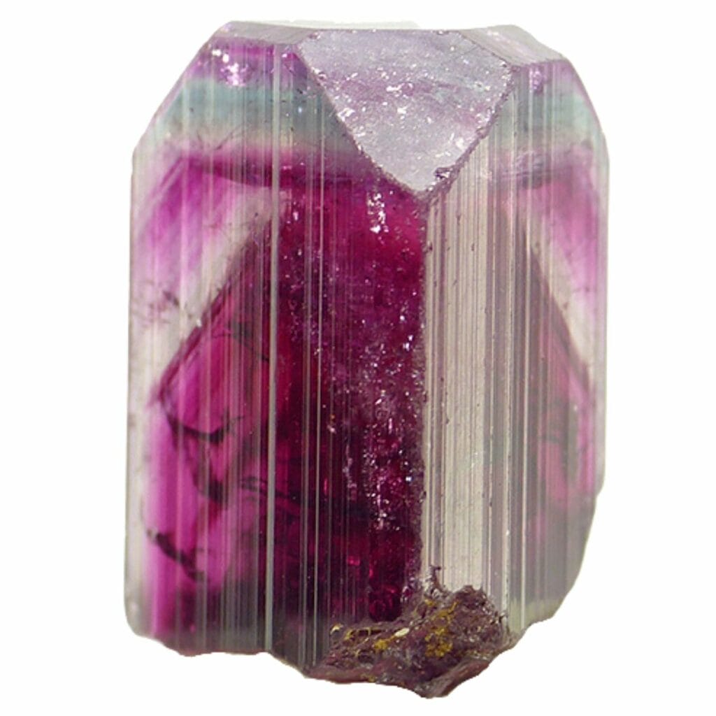 rough bicolor violet and green tourmaline crystal