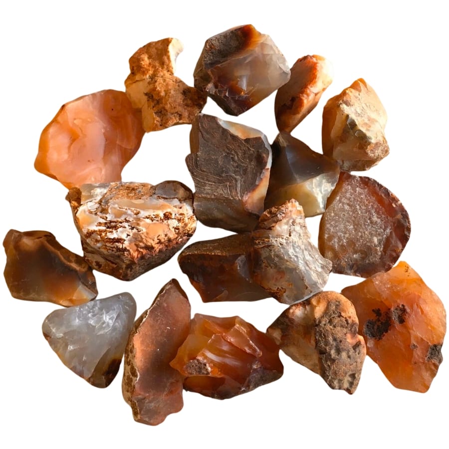 Pieces of raw carnelian in different shades of hues and textures