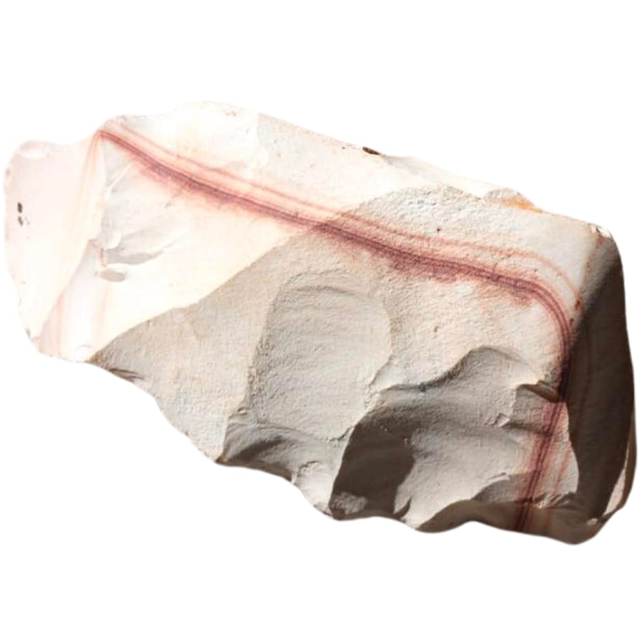 A rough specimen of white flint with brownish red lines