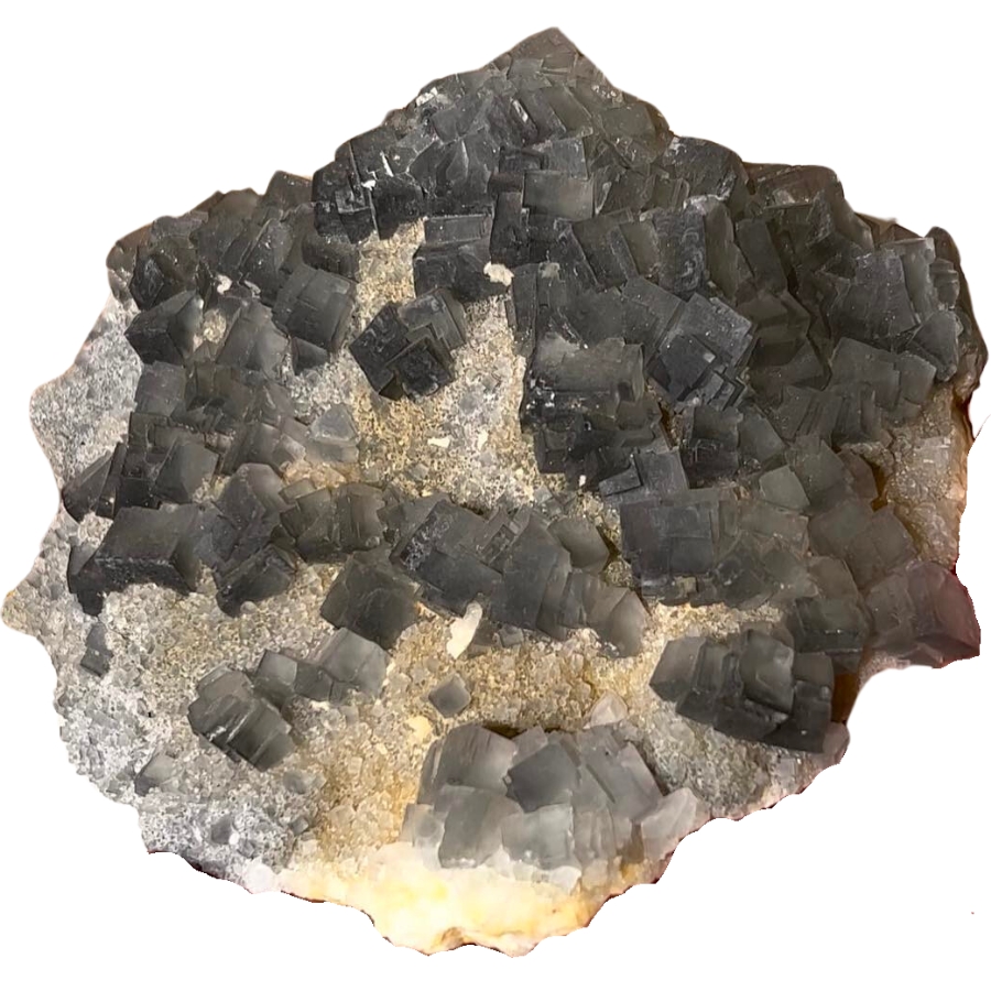 Small cubic crystals of dark grey fluorite on sphalerite