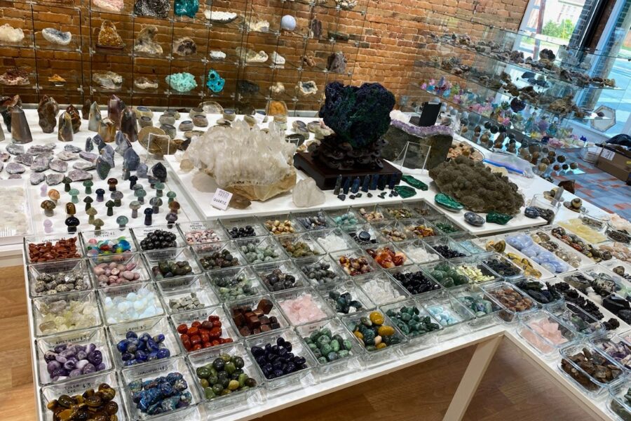 shelves and cases with different rocks and minerals on display