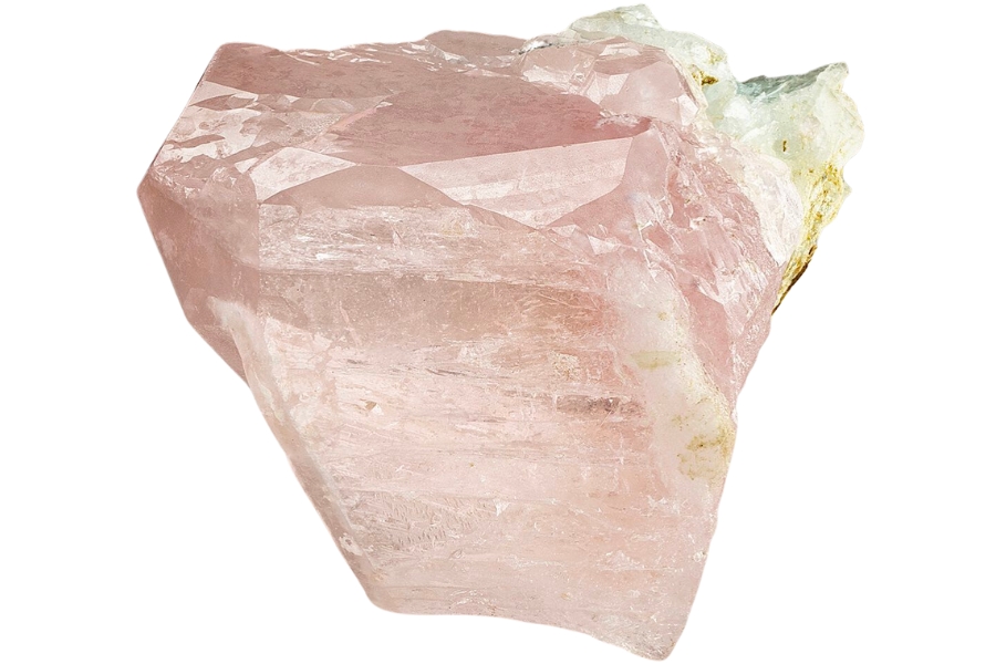 A raw light pink-colored morganite with white albite on the upper right side