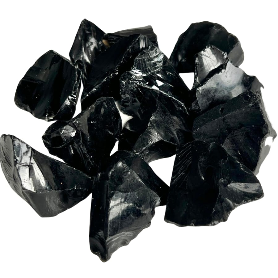 Pieces of raw, glassy black obsidian