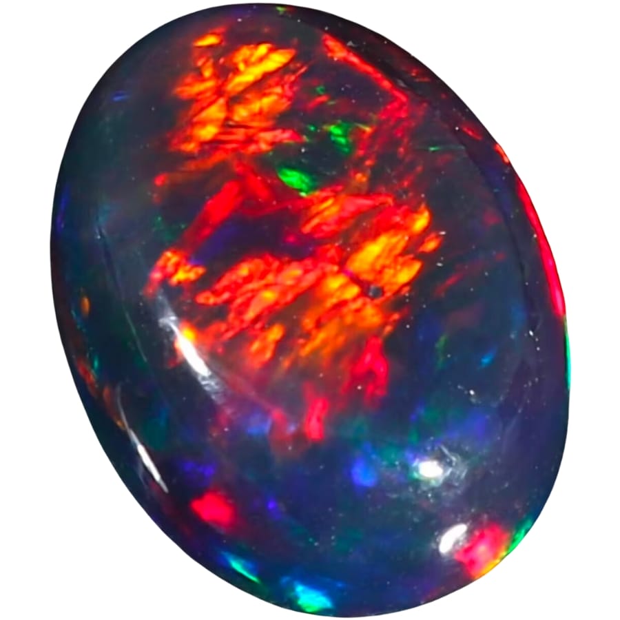 Black fire opal cabochon showing its clear fire