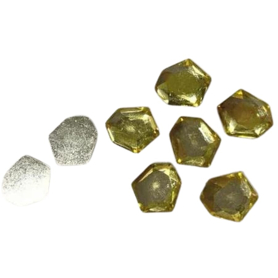 A few pieces of plastic pyrite with a hexagonal shape