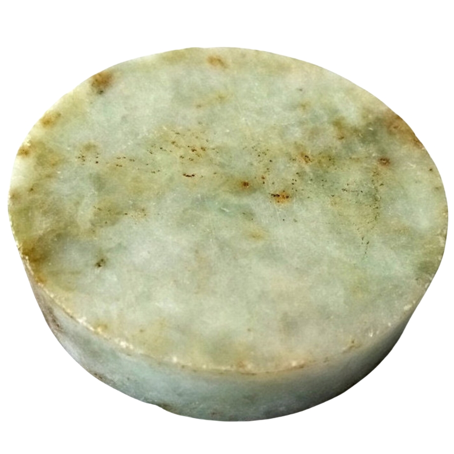 A unique and circular slab of rough jade