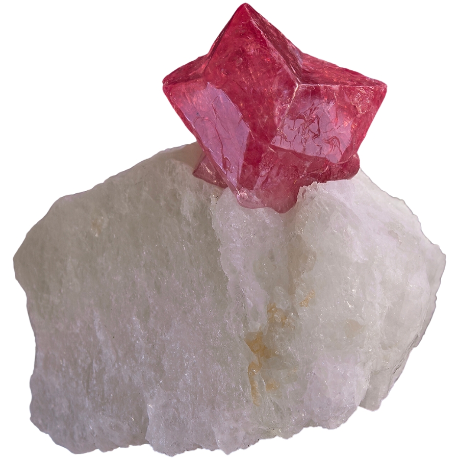 Star-shaped pinkish-red spinel crystal on white calcite matrix