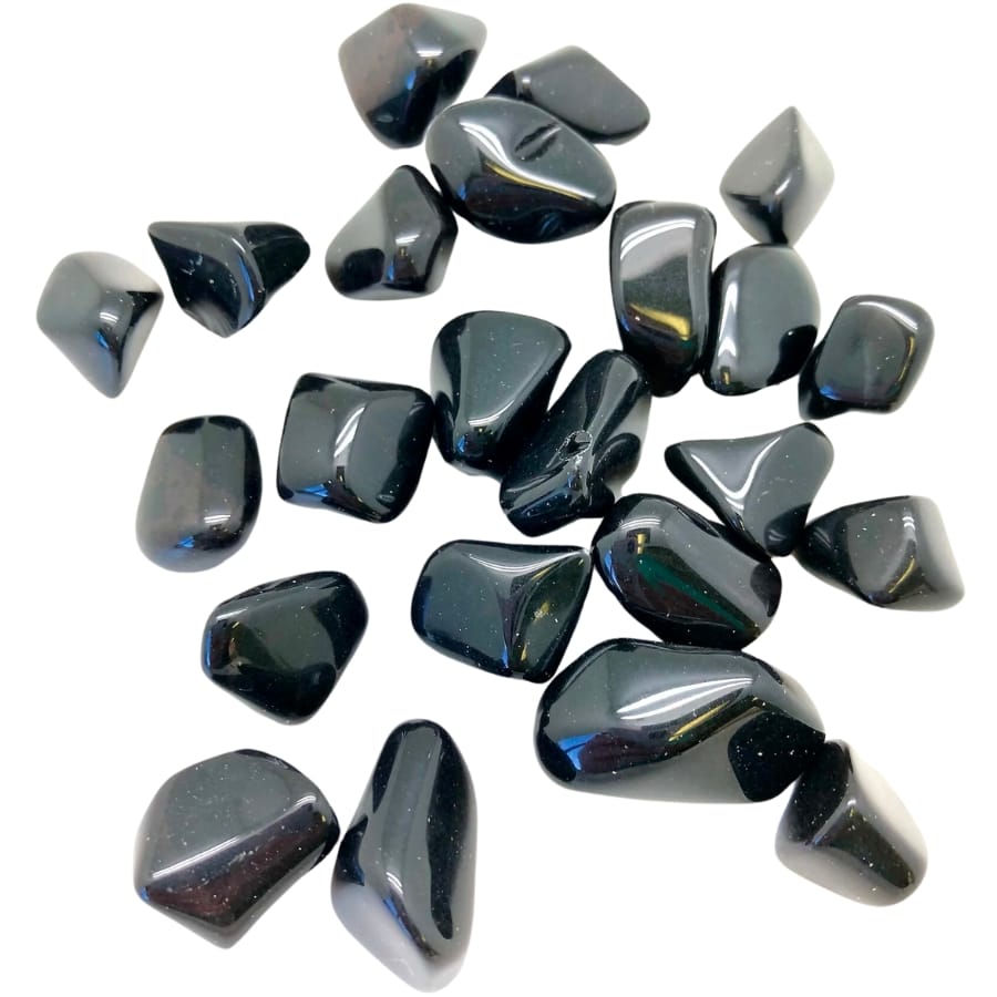 Shiny pieces of tumbled black onyx stones