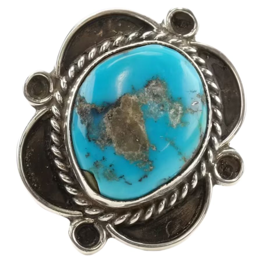 sky blue Bisbee turquoise cabochon in a silver setting