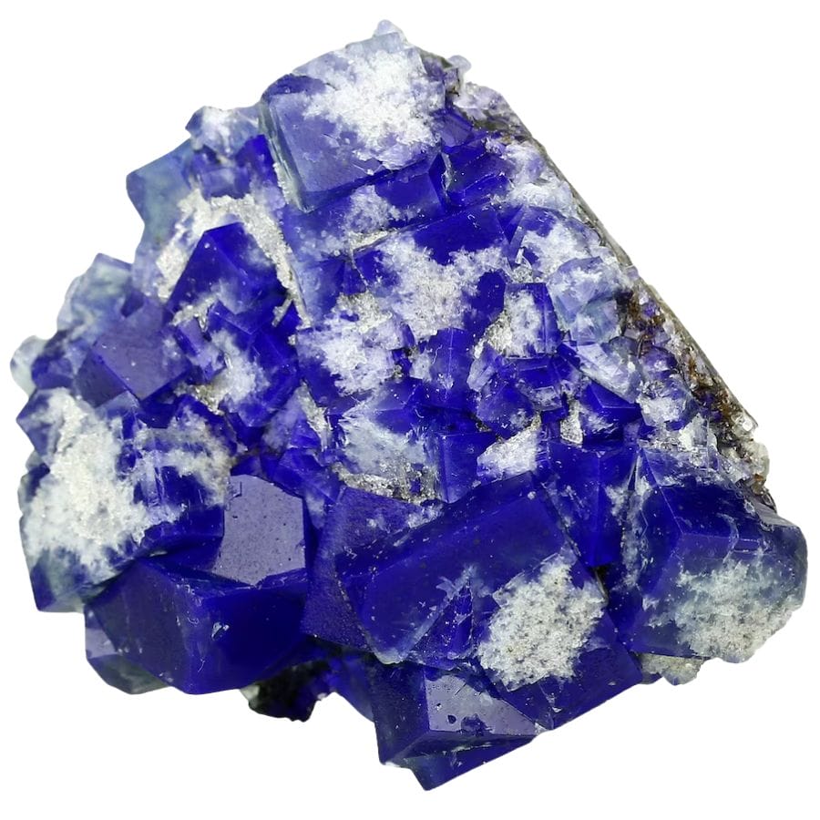 cubic fluorite crystals glowing deep blue under UV light