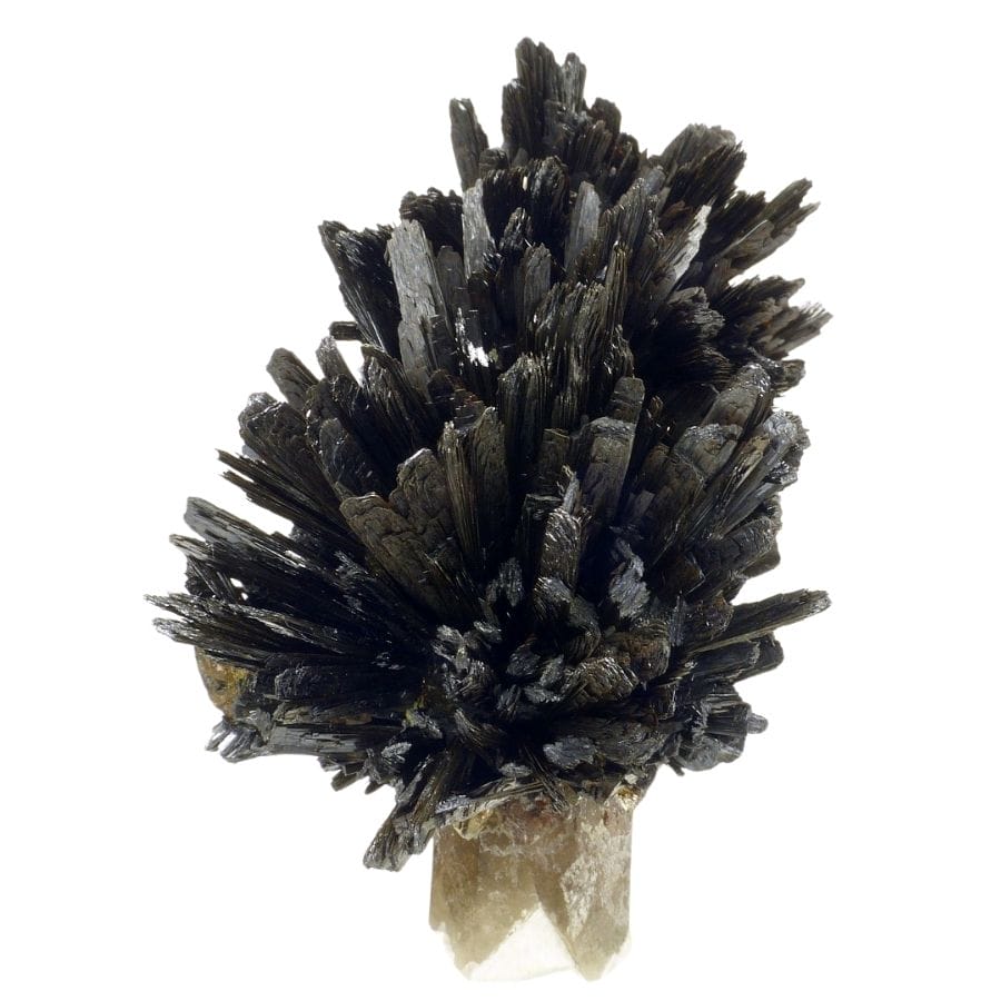 black goethite crystals clustered on a quartz crystal