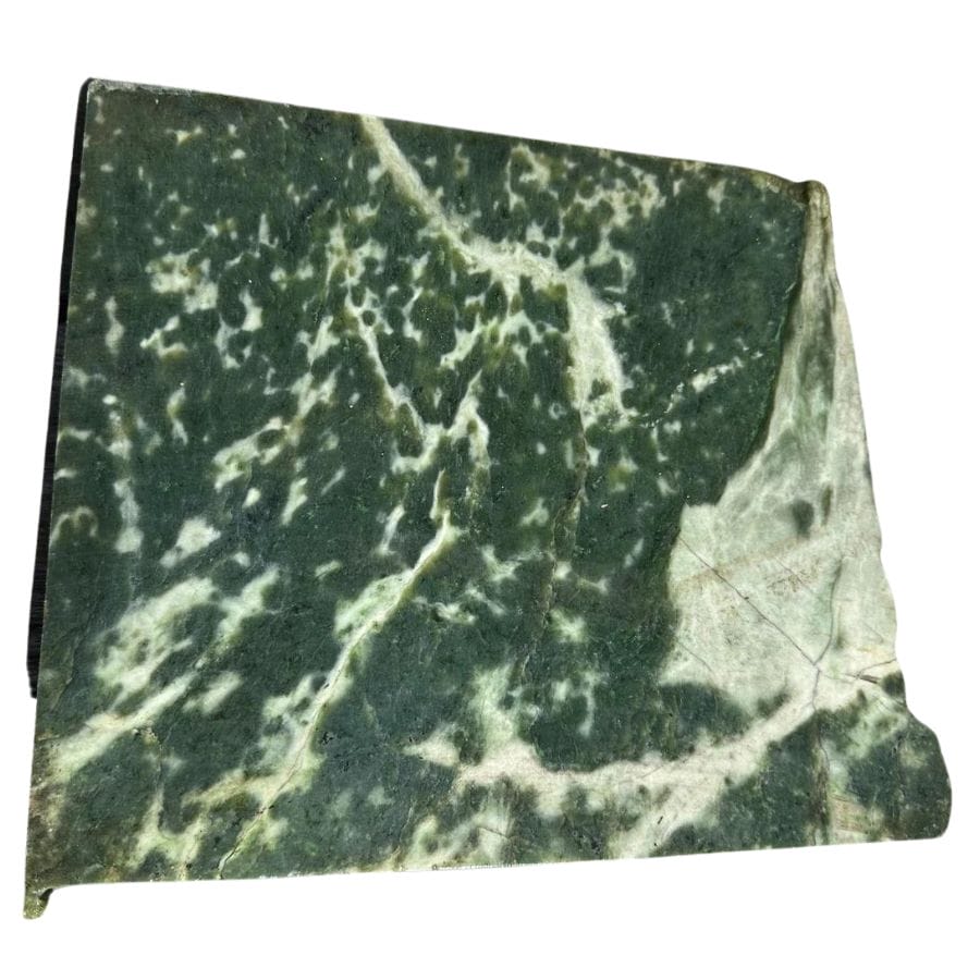dark green nephrite jade slab with white veins