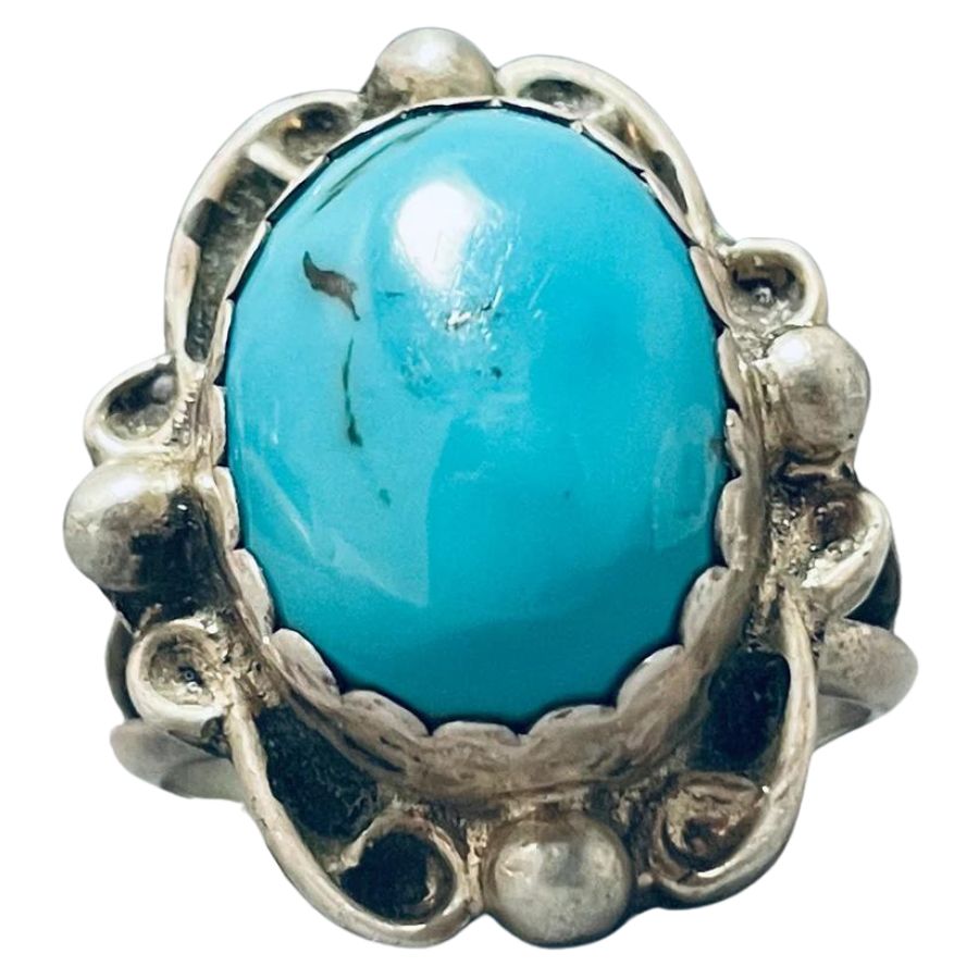 oval sky blue Red Mountain turquoise cabochon in a silver setting