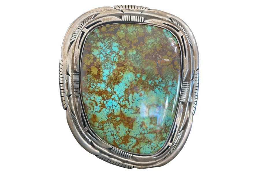 turquoise with brown matrix in a silver setting