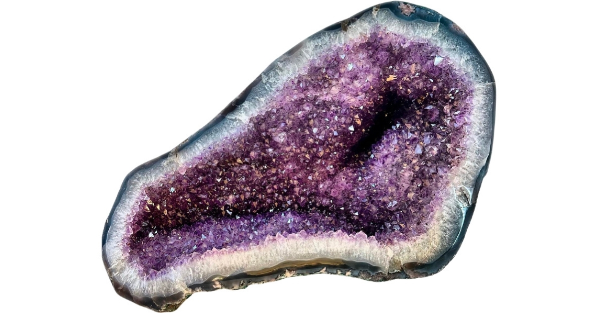 A huge amethyst geode showing spectacular purple crystals