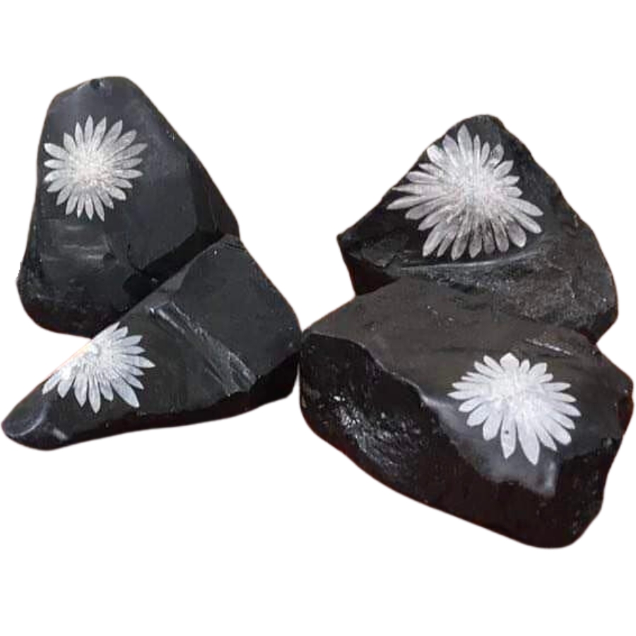 Four raw pieces of chrysanthemum jaspers with clear details of the flower pattern
