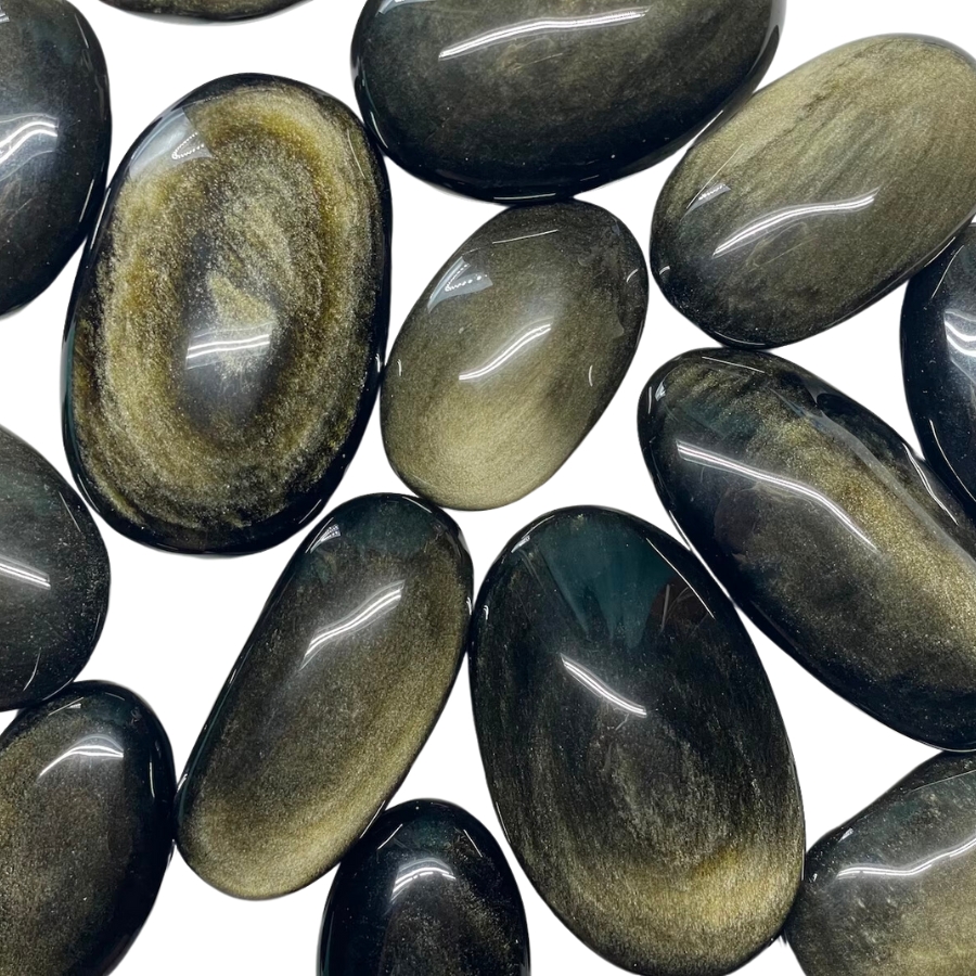 Different sizes of gold sheen obsidian palm stones