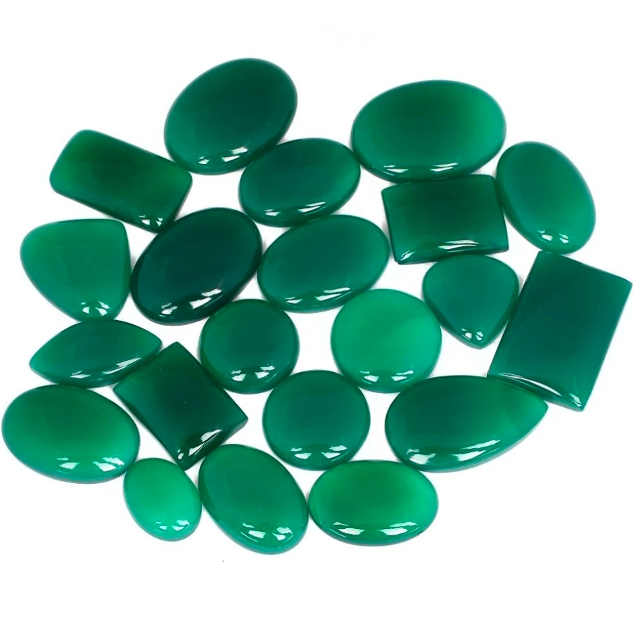 Several pieces of polished green onyx in different shapes