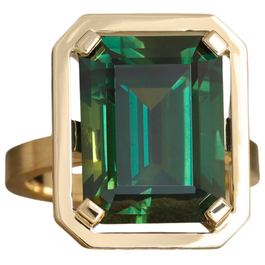 A beautifully-cut green sapphire set on a gold ring