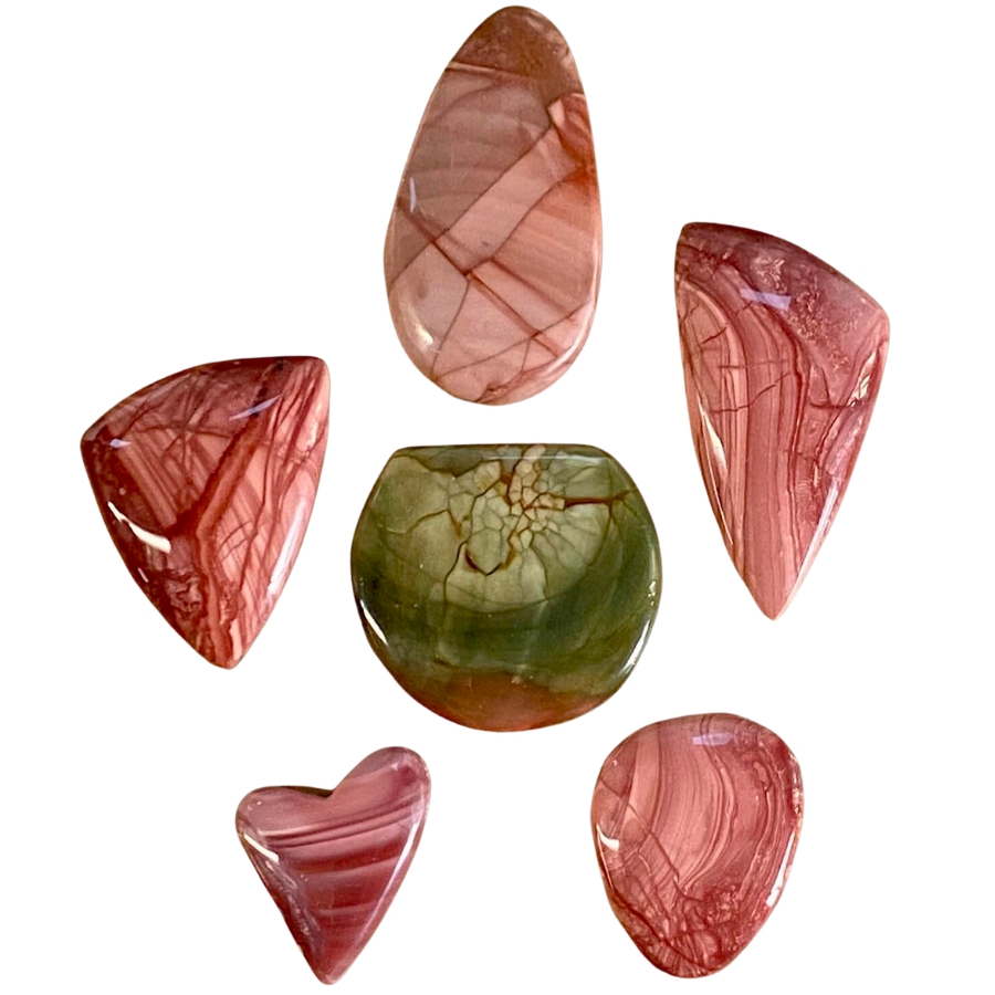 Five pieces of shiny, cut, and polished imperial jaspers in light red and green colors