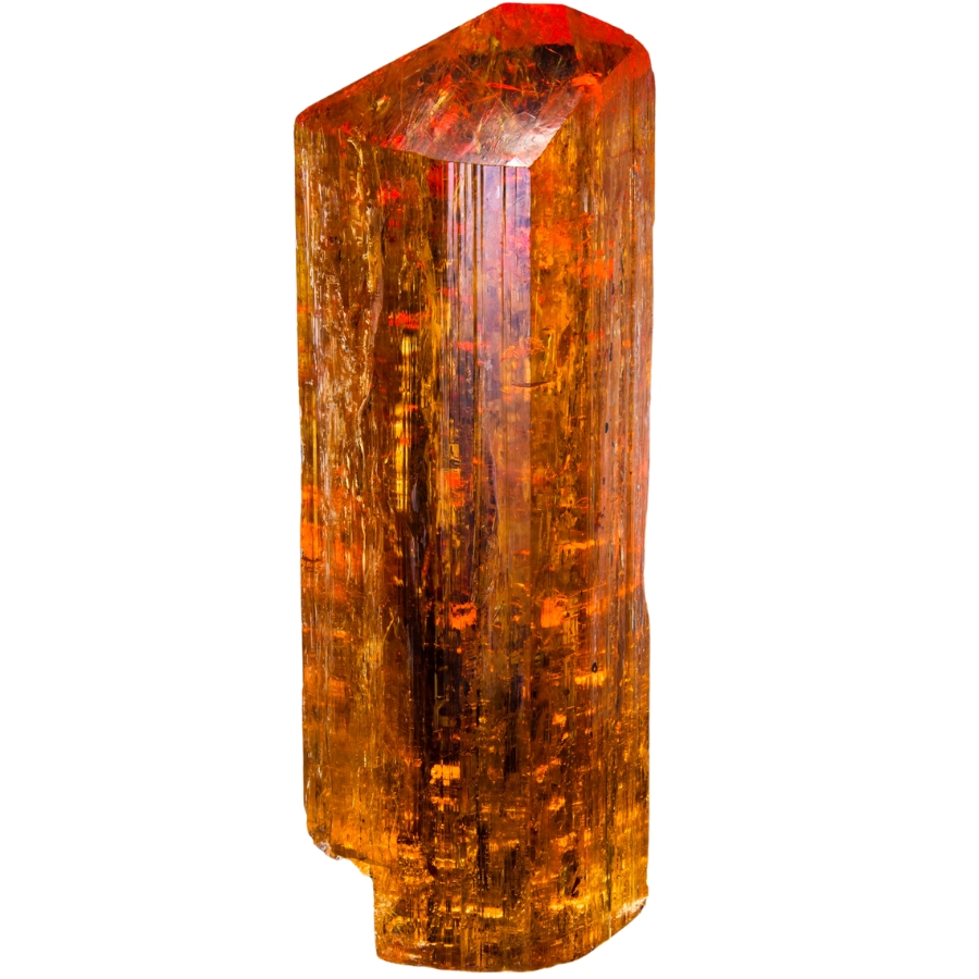 A single crystal of imperial topaz with spectacular internal flames from Brazil