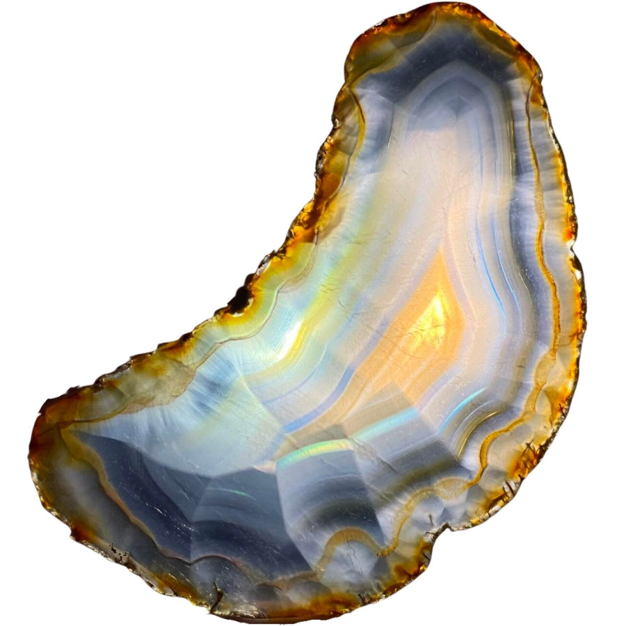 A slice of iris agate showing rainbow colors