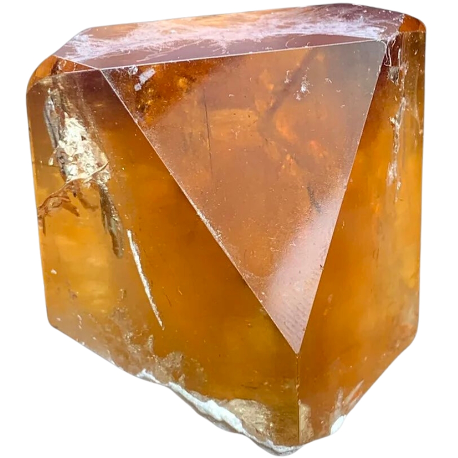 A damage-free, terminated, honey-colored topaz crystal