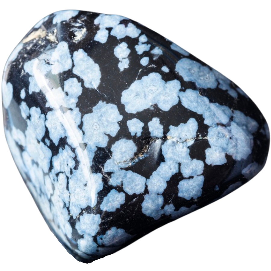 A snowflake obsidian showing dominant white patterns over black surface